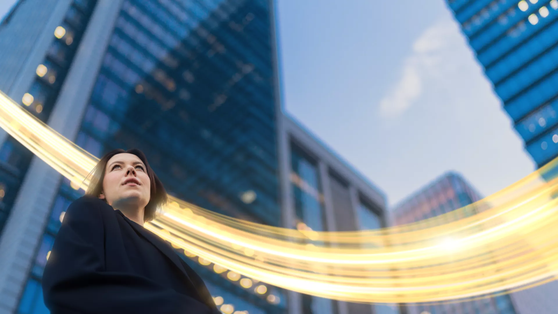 woman looking up at skyline