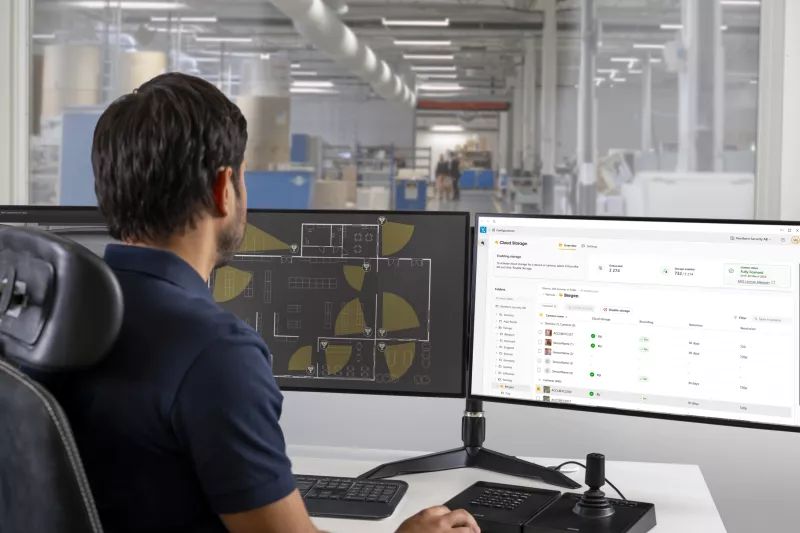 Man looking at screen with ACS cloud