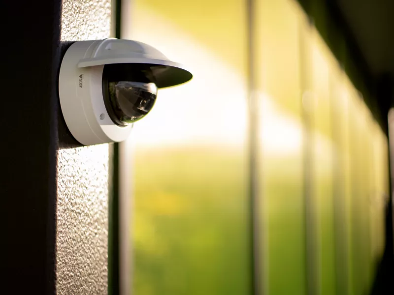 P32 Camera mounted on wall with green windows