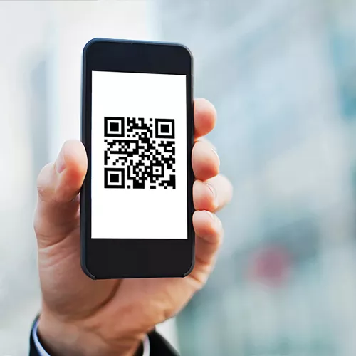 smartphone with qr code on screen